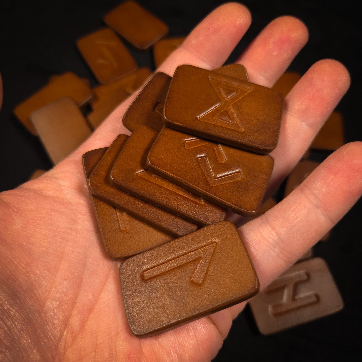 Holder Leather Elder Futhark Runes in hand